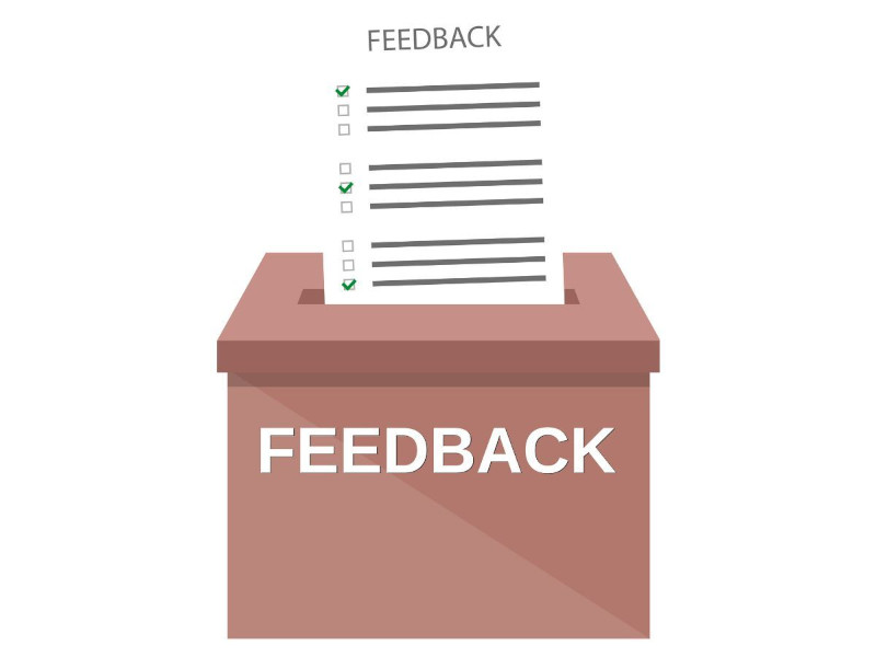 A paper with the word Feedback going into a box.